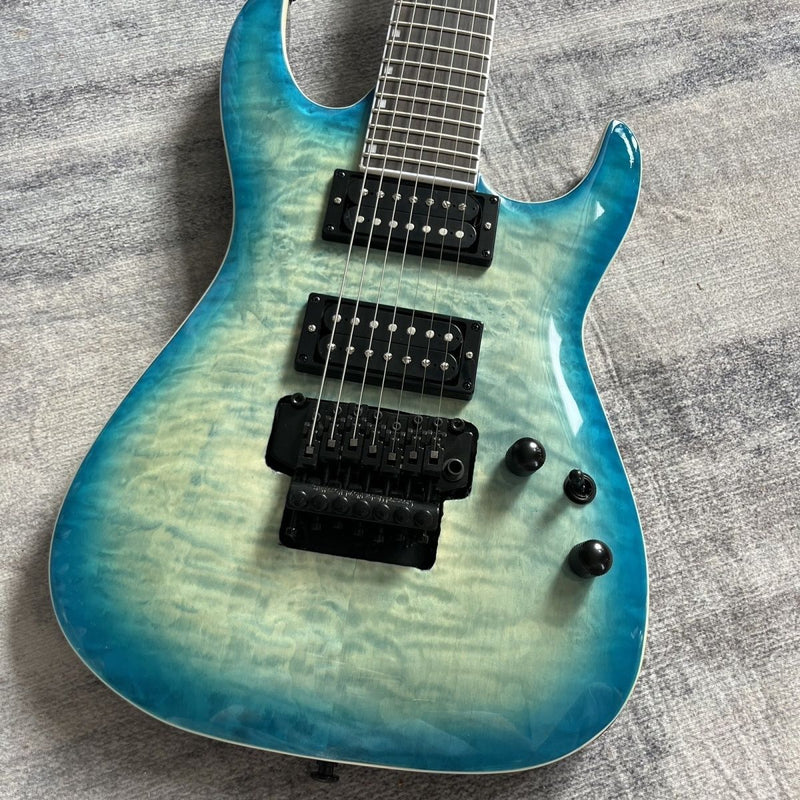 7-String ESP Style Electric Guitar with Gloss Blue Burst Quilted Maple Top & Floyd Rose Style Tremolo(LRG-121)